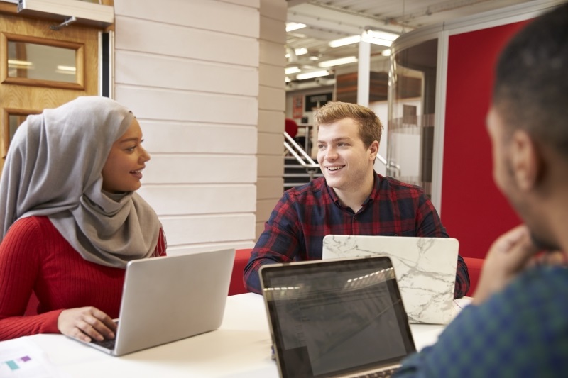 group of university students collaborating on project