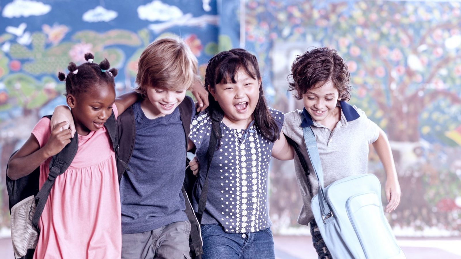 Multi ethnic group of children playing together.