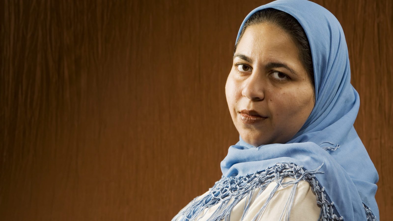 Portrait of a Muslim Woman in a Blue Head Scarf