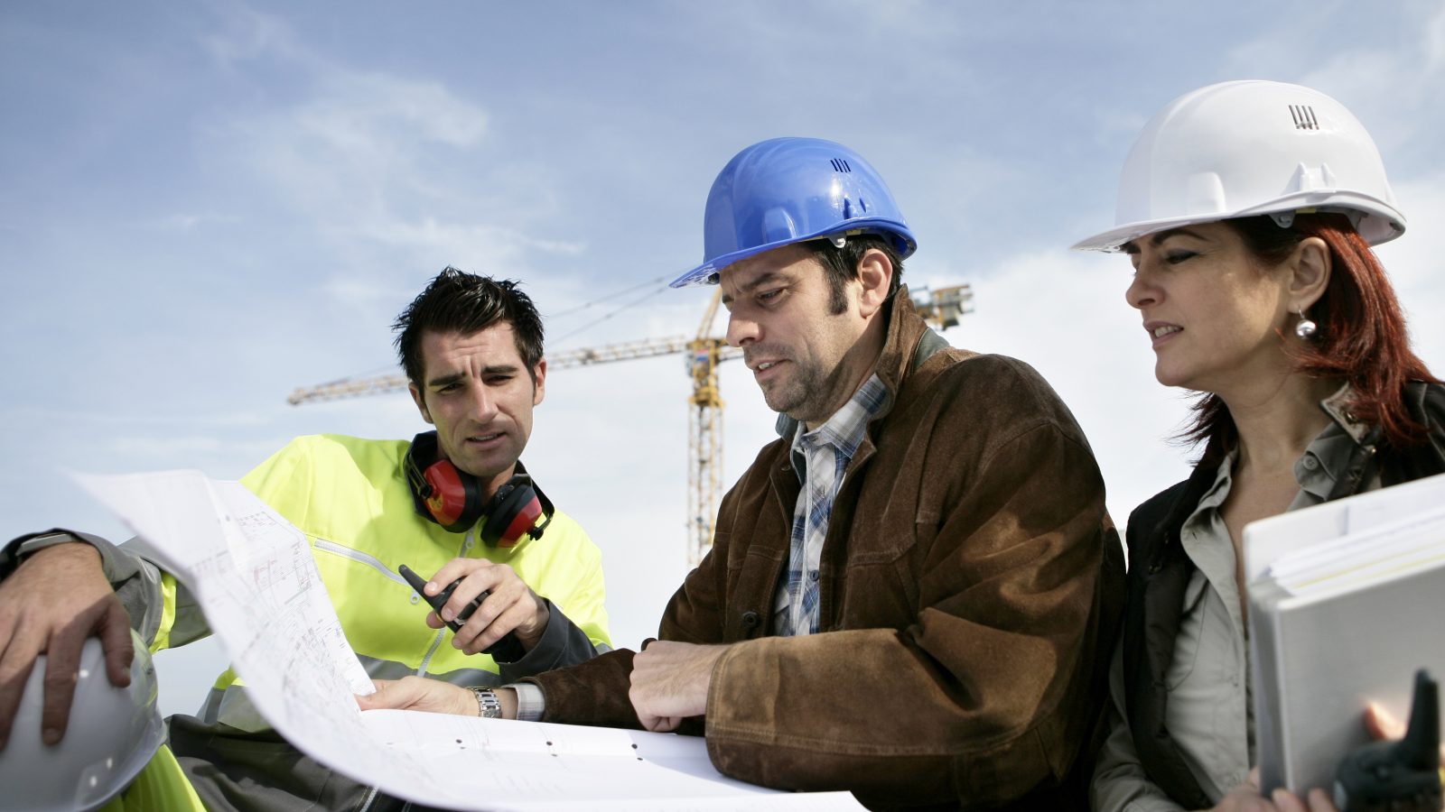 Construction workers discussing plans