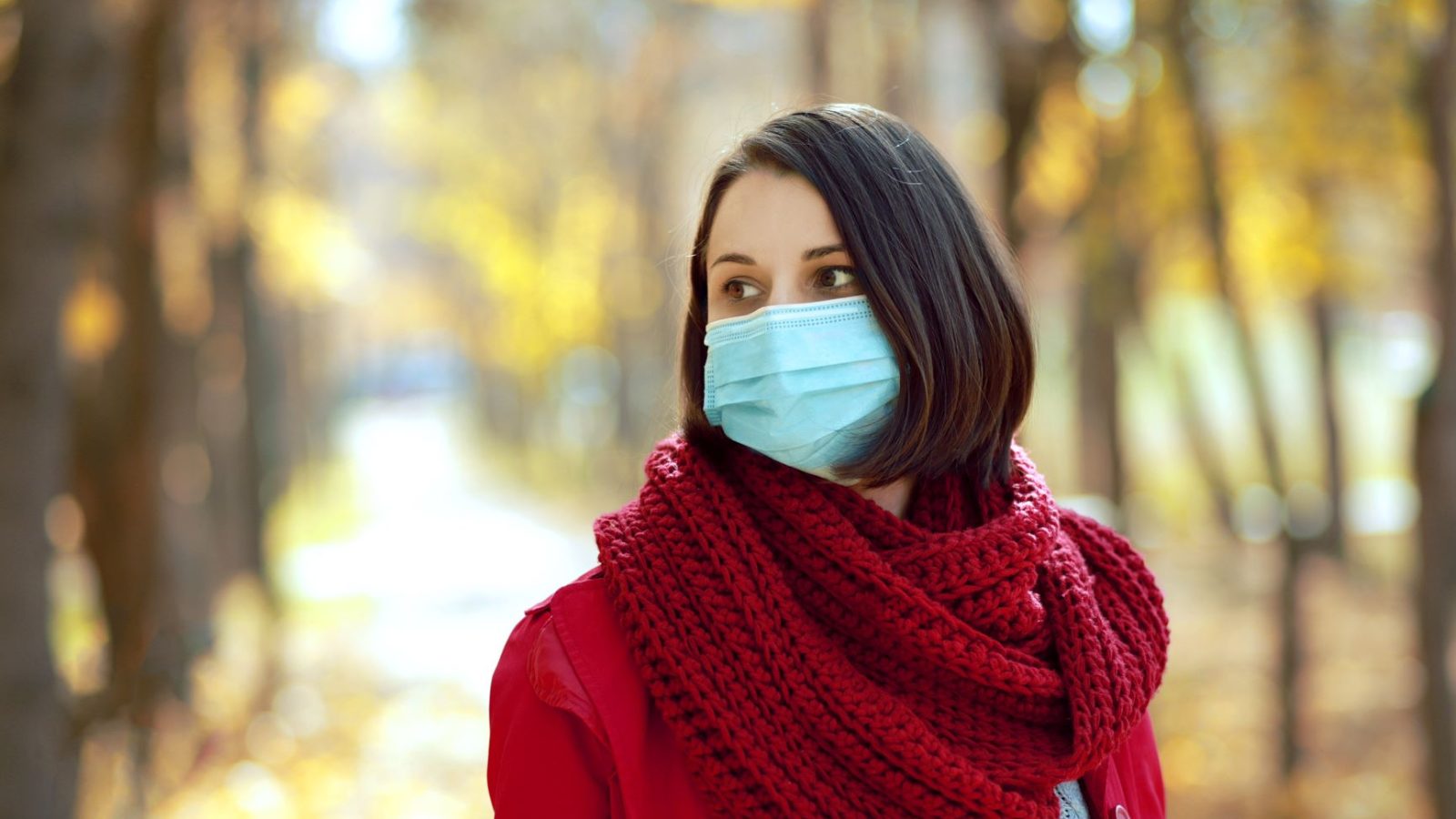 young woman in medical protectiv face-mask