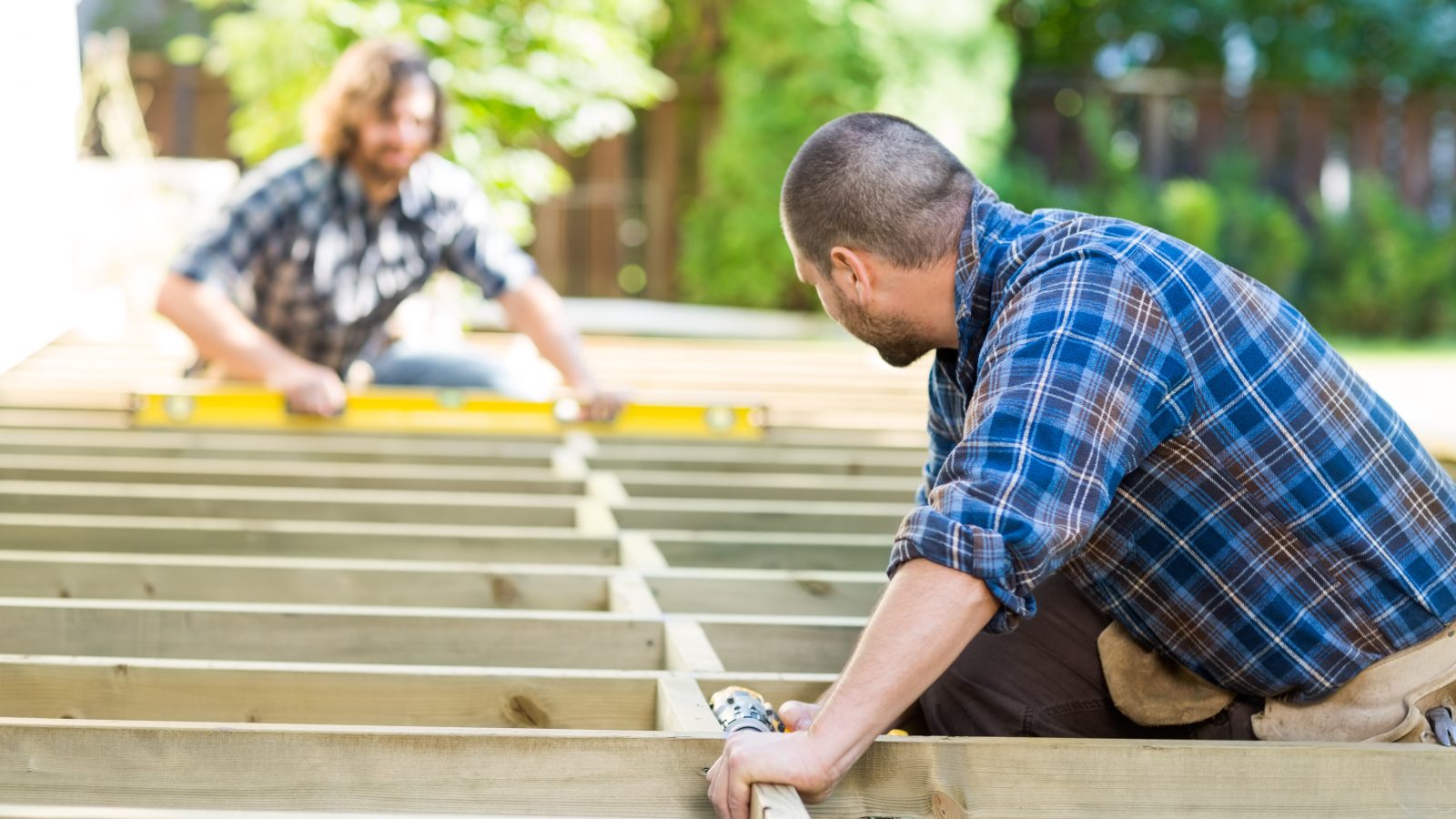 Carpenters Working At Construction Site
