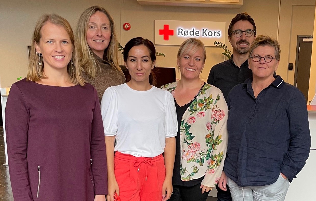 Group photo of people representing the Red Cross.