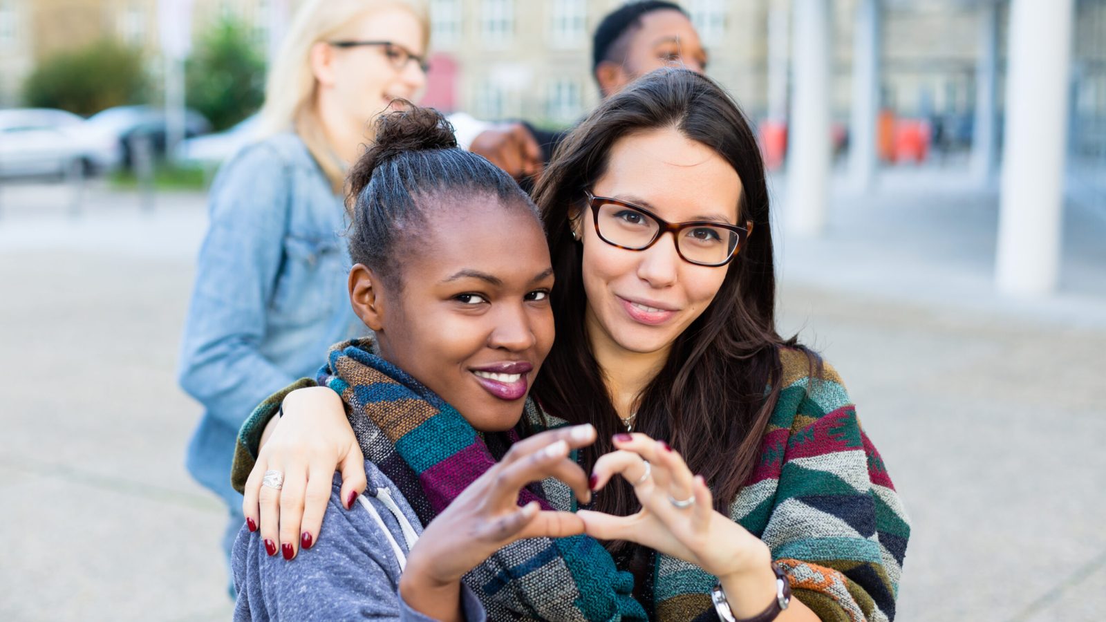 Diversity friends in city, group of African, Asian and Caucasian people
